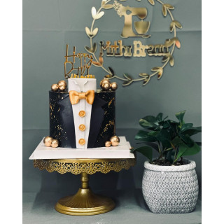 Elegant Tuxedo Birthday Cake with Golden Accents